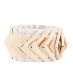 Textured leather cuff in off white Gold tone hardware throughout Tonal woven leather throughout Logo stamp at underside Button closure Tone on tone stitching Approx. 3.5" width 7" interior circumference 50% metal, 50% leather Color:White/Gold Made in France Adjustable White Leather Bracelets, Adjustable White Leather Bracelet, Luxury White Leather Jewelry, Modern White Cuff Bracelet, Designer Adjustable White Bracelets, Luxury White Cuff Bracelets, France Colors, Valentino Rockstud, Tone On Tone