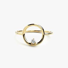 Gold KT: 14K Diamond Cut: Round Number of Stones: 1 Stone Size: 2.4MM Total CTW: 0.05ctw Diamond Color Clarity: G Color SI Clarity Width of Band: 1.25mm Setting Type: 3 Prong Up your style game with this fashionable and chic open diamond ring. The ring features a circular design adorned with a single diamond in a three-prong setting. Stylish and eye-catching, this gold ring will look stunning next to anything. The diamond ring is handcrafted and made to order for a luxury piece you can cherish f Circle Diamond Ring, Circle Diamond Rings, Open Diamond Ring, Gold Minimalist Ring, Wedding Ring Round, Circle Diamond, Lab Grown Diamonds Engagement, Gold Circle, Local Jewelry