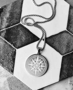 《《  SYMBOLIC COLLECTION  》》 THE DETAILS The "MARITIME COMPASS MEDALLION" Necklace is designed with an exquisitely detailed Silver Stainless Steel Maritime Compass Medallion Pendant, hung from a Silver Stainless Steel Box Chain available in your choice of length! THE SYMBOL 🧭 COMPASS: Known as a symbol of "TRAVEL, DIRECTION, & ADVENTURE" often worn or gifted to symbolize two souls traveling together on the same path in life, one being lost without the other. 🔷️💠🔷️View our entire SYMBOLIC COLLECTION here: https://www.etsy.com/shop/mrmackjewelry/?section_id=27090591 MATERIALS * 1 1/2" Diameter Silver Stainless Steel Maritime Compass Medallion Pendant  * 3mm Silver Stainless Steel Box Chain  * Silver Stainless Steel Lobster Clasp ⤵️NOTE: Stainless Steel is an Oxygen Resistant Metal, which Vintage Stainless Steel Necklaces With Box Chain, Vintage Stainless Steel Box Chain Necklaces, Silver Medallion Necklace With Chain As Gift, Vintage Stainless Steel Jewelry With Compass Design, Stainless Steel Chain Jewelry For Father's Day, Vintage Stainless Steel Box Chain Jewelry, Vintage Medallion Stainless Steel Necklaces, Vintage Medallion Stainless Steel Necklace, Vintage Stainless Steel Medallion Necklace