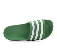 Head to the beach or run errands in solid style wearing the adidas® Adilette Aqua Slides! With a quick drying upper, cushioned footbed, and EVA traction outsole you'll be able to stay on your feet in comfort and with style all day! Synthetic upper, Easy slip-on design, Round open toe, EVA contoured footbed for cushioned comfort and gentle support, Injected EVA outsole for lightweight traction, adidas® branding details | Women's Adidas Adilette Aqua Sport Slide Sandals in Preloved Green Size 8 Adidas Slides For Swimming In Summer, Adidas Slides For Summer Swimming, Green Sport Sandals For Spring Sports, Green Slip-on Sport Sandals, Sporty Green Slides For Outdoor, Adidas Sandals For Spring Swimming, Adidas Sandals For Summer Outdoor Activities, Sporty Green Non-slip Slides, Adidas Casual Sport Sandals For Summer