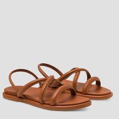 Whether you are on an island or just island time, the OluKai Tiare Strappy Sandal is a great friend. This strappy 100% leather slide is designed to be worn casually or dressed up so that your feet can feel good for tomorrows adventure. Leather Slip-on Sandals For Beach Season, Leather Open Toe Slingback Sandals For Beach Season, Leather Sandals For Summer Vacation, Brown Slip-on Slingback Sandals For Beach, Summer Vacation Leather Slingback Sandals, Leather Flip Flops For Beach, Leather Flip Flops For Beach Season, Leather Flip Flops For The Beach, Leather Slingback Sandals For Summer Vacation