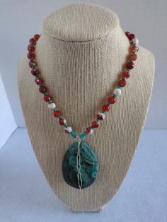 "This single strand OOAK necklace was made with a Faceted Turquoise Simply wired Pendant, Faceted Cream and Orange Crab Fire Agate Rounds and tiny genuine Faceted Turquoise Rondelles.  Findings are Silver Plate. Necklace - 18\" Pendant is an additional 2 1/4\"" Turquoise Ocean, Simple Pendant, Pendant Necklace Simple, Plate Necklace, Fire Agate, Jasper Pendant, Genuine Turquoise, Ocean Jasper, Turquoise Beads