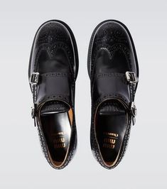 Add a refined touch to your collection with these monk strap shoes from Miu Miu. Made in collaboration with footwear experts Church's, this pair is crafted from brushed leather and features silver-toned buckles and broguing..Upper: leather.Lining: leather.Sole: leather insole, rubber sole.Toe shape: round toe.Made in Italy.Includes: shoe box.Designer color name: Nero.Closure: buckle fastening.True to size.European sizes Miu Miu Ankle Strap Leather Sandals, Designer Leather Heels By Miu Miu, Brown Luxury Monk Strap Shoes, Classic Leather-lined Monk Strap Shoes For Derby, Brown Leather-lined Monk Strap Shoes For Derby, Miu Miu Shoes, Monk Strap Shoes, Shoes Dress, Strap Shoes