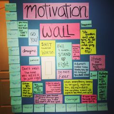 a bulletin board with sticky notes on it that says motivational and motivational wall