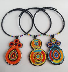 This listing is for ALL 5 beaded necklaces shown above. These necklaces are 100% handmade using fine beads. They come in different colors and designs. Buy multiple items and pay shipping for ONE item ONLY. They ship through DHL Express. More neckleces here; https://www.etsy.com/shop/TribalTess?ref=seller-platform-mcnav&section_id=21306083 Back to my shop; https://www.etsy.com/shop/TribalTess?ref=seller-platform-mcnav Handmade Round Beaded Necklace For Festivals, Beaded Necklaces For Festivals As Gifts, Beaded Necklaces For Festivals And Gifts, Gift Pendant Beaded Necklace With Tiny Beads, Festive Necklaces With Colorful Beads For Gifts, Festival Gift Necklaces With Colorful Beads, Festive Gift Necklaces With Colorful Beads, Festival Gift Necklace With Colorful Beads, Dangle Beaded Necklaces With Tiny Beads For Gifts