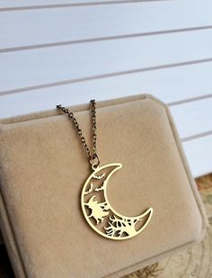 Crescent Moon Pendant This Halloween pendant is a great piece of jewelry to add to your collection or gift to that special someone in your life. Pendant: ~ Gold ~ Raw brass ~ Nickel, Lead and Cadmium free ~ Size: 25mmx33mm Chain: ~ Antique Gold   ~ Choose Your Chain Length During Checkout. 👉 Link to Our STOREFRONT: https://www.etsy.com/shop/FashionCrashJewelry?ref=shopsection_shophome_leftnav&ga_search_query=crystal%2Bnecklace Our Motto ~ Happy Customers Are Awesome 🌞Let us know of any problem Moon Shaped Brass Necklace For Gift, Moon-shaped Brass Necklace For Gift, Half Moon Metal Necklace For Gifts, Half Moon Metal Necklace For Gift, Magical Sun And Moon Design Necklace Gift, Magical Sun And Moon Design Jewelry As Gift, Magical Moon Shaped Jewelry For Gifts, Magical Moon Shaped Jewelry Gift, Magical Moon-shaped Jewelry For Gifts