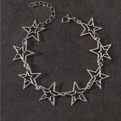 Vintage Punk Star Charm Bracelet Color: Silver Product Measurement Length:8.1-10 Inch Metal Star-shaped Bracelets, Edgy Adjustable Star-shaped Jewelry, Adjustable Star-shaped Edgy Jewelry, Adjustable Edgy Star-shaped Jewelry, Adjustable Edgy Star Jewelry, Edgy Star-shaped Metal Jewelry, Party Bracelets With Star Charm In Metal, Party Metal Bracelets With Star Charm, Trendy Silver Star Bracelet