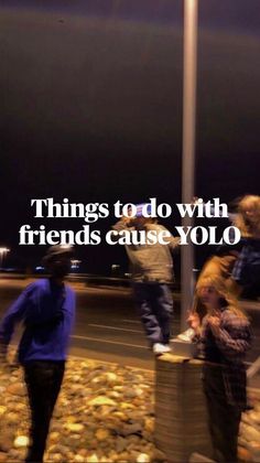 people walking down the street at night with text that reads, things to do with friends cause yolo