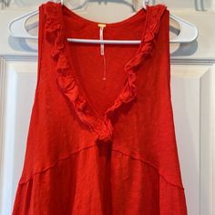 Gorgeous Deep Orange-Almost Red Color! Vibrant! Sleeveless, Empire Waist, Ruffle V-Neck, Ruffle Hem, Raw Edging, Cotton Linen Blend So Lightweight And Flowy New Without Tags! Great For Layering! Size Xs But Can Certainly Fit Small Possibly Medium Has Stretch 52% Linen 48% Cotton Ptp 16” But Stretches To 21” Length 24” Boho Bohemian Beach Summer Spring Lounging Layering Lightweight Casual Red V-neck Vest, Casual Red V-neck Tank Top, Red Sleeveless Tank Top For Summer, Red Sleeveless Tank Top For The Beach, Red Sleeveless Tank Top For Beach, Sleeveless Red Tank Top For Beach, Red Vest Top For Summer, Red Camisole Tank Top For Summer, Red Cami Tank Top For Summer