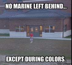 a person standing in front of a building with the words no marine left behind except during colors