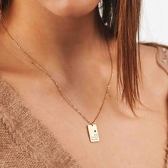 ELEGANT ENGRAVED RECTANGLE NECKLACE Latest trend and add to our contemporary collection this elegant engraved rectangle necklace. A sophisticated, delicate profile holds a unique meaning: up to four names engraved with a heart. An extraordinary gift to treat somebody you love. CHARACTER LIMIT Max 10 letters per name ITEM SPECIFICATIONS • Finish: 18K Gold ∙ 925 Sterling Silver ∙ Rose Gold• Dimensions: Adjustable Length Chain 15” | Pendant 12x18mm Everyday Elegant Laser Engraved Jewelry, Elegant Rectangular Necklace For Mother's Day, Elegant Rectangular Bar Necklace As Gift, Elegant Laser Engraved Necklaces For Mother's Day, Elegant Rectangular Bar Necklace For Gift, Elegant Rectangular Pendant Name Necklace For Anniversary, Rectangular Engraved Charm Necklaces For Anniversary, Elegant Rectangular Pendant Necklace For Mother's Day, Elegant Rectangular Name Necklace As A Personalized Gift