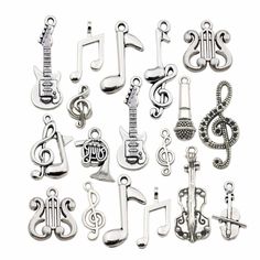 various metal musical instruments and trebles are shown in this image on a white background