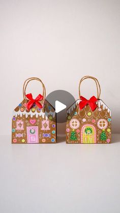 two small gingerbread houses with red bows