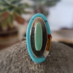 Beautiful multicolored Turquoise and Sterling Silver Ring! Totally unique. Handcrafted Native American Jewelry. Perfect pinky ring! Turquoise Multi-stone Ring For Gift, Oval Turquoise Inlay Rings, Oval Turquoise Rings With Inlay, Artisan Oval Multi-stone Turquoise Ring, Oval Turquoise Multi-stone Ring, Oval Multi-stone Turquoise Ring, Unique Multicolor Turquoise Cabochon Ring, Unique Multicolor Cabochon Turquoise Ring, Handmade Artisan Multicolor Turquoise Ring