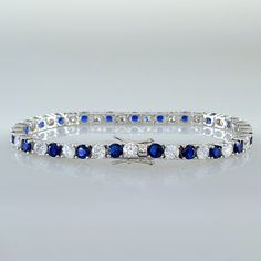 Brand New Women's Diamond & Sapphire Gemstone Tennis Bracelet 14k White Gold Plated Sterling Silver 2ct Natural Blue Sapphire Gemstones Genuine 2ct Lab Created Radiant Cut Diamonds Available Sizes: 6" 6.5" 7" (Most Common Women's Size) 7.5" 8" 4mm Width Retail Price $500 Buy With Confidence From A Trusted Seller With A 99%+ Feedback Rating! A0883 (Id-1292) White Gold Sapphire Gemstone Tennis Bracelet, Elegant Blue Sapphire Tennis Bracelet, Sapphire Sterling Silver Tennis Bracelet, Luxury Sapphire Gemstone Tennis Bracelet, Sapphire Color Brilliant-cut Cubic Zirconia Bracelets, Blue Sapphire Gemstone, Diamond Tennis Bracelet, Radiant Cut Diamond, Jelly Shoes