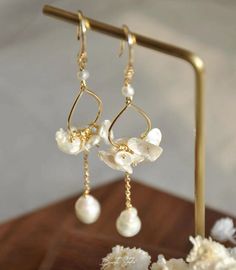 Made of natural freshwater petal pearls, exude elegance and boast a delightful luster. They are perfect for pairing with dresses or for wearing on formal occasions. P E A R L ∙ E A R R I N G S Total length: about 7cm  Pearl: Handpicked High Luster  petal pearls  about：8-10mm  Setting : 14k Gold-filled Hook (100% nickel free, great for sensitive ears) O T H E R ∙ I N F O R M A T I O N ✨ Our pieces are made with care and attention to details. ✨Freshwater pearls are entirely natural, which means that each one has its own distinct size and shape. I'll take care to ensure that the pearls harmonize beautifully with each other. ✨ The orders typically take 1-3 days to process.  ✨ Your satisfaction is always my priority. Please feel free to contact me if you have any questions or requests regarding Delicate Dangle Pearl Earrings, Delicate Pearl Dangle Earrings, Delicate Baroque Pearl White Earrings, Elegant Flower-shaped Hoop Earrings Gift, Elegant Flower-shaped Hoop Earrings For Anniversary, Elegant Flower Hoop Earrings For Anniversary, Elegant White Flower Hoop Earrings, Delicate Pearl Dangle Bridal Earrings, Delicate Baroque Pearl Earrings