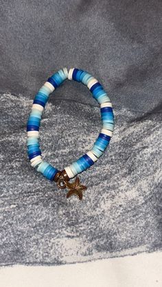 Shades of Blue clay beads with starfish charm Ocean Themed Beaded Bracelets, Clay Bead Bracelet Ideas Ocean, Clay Bead Bracelet Blue, Ocean Themed Clay Bead Bracelets, Anklets To Make, Ocean-inspired Blue Beaded Bracelets For Beach, Make Clay Beads, Bracelets For Boyfriend, Blue Clay