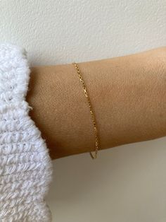 Before placing an order please check the estimated shipping times. If you need your order in a hurry shipping upgrades are available. Thank you. This gorgeous little bracelet is perfect for the minimalist! It also looks great stacked with other dainty bracelets. D E T A I L S *Made with a sparkly 18k gold filled box chain. *Gold fill is a wonderful alternative to real gold and unlike gold plating does not rub off. *It closes with a gold fill spring clasp and all the findings are gold filled too. Minimalist Hypoallergenic 14k Gold-filled Bracelets, Minimalist Hypoallergenic 14k Gold Filled Bracelets, Dainty Chain Bracelet As Gift, Dainty 14k Gold Filled Adjustable Chain Bracelet, Minimalist Yellow Gold Hypoallergenic Bracelets, Minimalist Hypoallergenic Yellow Gold Bracelets, Dainty Gold Cable Chain Bracelet Gift, Dainty Gold Bracelet With Cable Chain As Gift, 14k Gold Filled Cable Chain Bracelet Gift