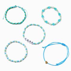 Show your love to the world with this pretty bracelet set in shades of blue. It includes three beaded stretch bracelets and two adjustable bolo bracelets that feature "LOVE", heart, and floral accents.Pack Size: 5Fit: Stretch, BoloMaterial: Plastic - Claire's Turquoise Love Beaded Stretch Bracelet Set - 5 Pack Adjustable Blue Stretch Bracelet With Heart Beads, Light Blue Beaded Bracelets With Round Beads, Trendy Turquoise Beaded Bracelets As Gift, Trendy Turquoise Beaded Bracelets For Gifts, Casual Light Blue Round Bead Jewelry, Casual Light Blue Beaded Bracelets, Casual Light Blue Round Beaded Jewelry, Adjustable Blue Bracelets With Heart Beads, Turquoise Friendship Bracelets With Colorful Beads