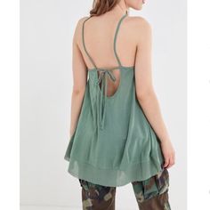 Green Strappy Tunic Top. Size Xs But Fits Large. New With Tags. Casual Tops With Built-in Bra For Day Out, Green Cami Top For Day Out, Casual Summer Tank Top With Built-in Bra, Scoop Neck Summer Tops For Spring, Green Stretch Top With Tie Back, Green Stretch Tops With Tie Back, Green Stretch Tie Back Top, Chic Green Tops With Built-in Bra, Summer Casual Tank Top With Built-in Bra