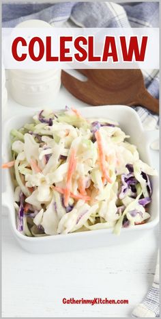 coleslaw in a white dish with carrots and cabbage