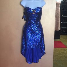 Blue Sequin Cocktail Dress Strapless And Comes With Attachable Straps Glamorous Blue Strapless Dress For Party Season, Blue Fitted Strapless Maxi Dress, Blue Fitted Strapless Party Dress, Blue Fitted Strapless Dress For Party, Blue Sequined Strapless Dress, Blue Strapless Dress With Sequins For Evening, Glamorous Blue Strapless Dress For Cocktail, Glamorous Blue Strapless Evening Dress, Blue Strapless Dress For Party Season