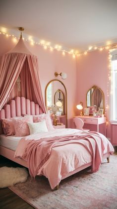 a bedroom decorated in pink and gold with lights strung above the bed, mirror on the wall