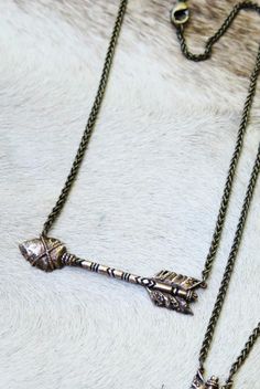 With a truly artistic process, Wanderlust + Wildhearts creates unqiue and timeless jewelry pieces that speak straight to the heart. This Painted Arrow Horizontal Necklace is first sketched in watercolor, hand carved into wax and finally cast in antique bronze. An ideal layering piece the Arrow Necklace carries with it a sense of direction, hope and anticipation as you head into the future.   Get the Deets:      Realistic pendant with geometric art.   Antique brass chain. The Arrow, Into The Future, Timeless Jewelry, Wild Hearts, Brass Chain, Geometric Art, Layering Pieces, Antique Bronze, Antique Brass