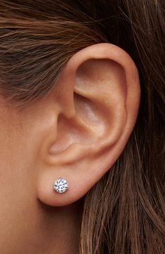 Round brilliant-cut diamonds sparkle in timeless studs designed with a three-prong martini setting that fits close to the ear for the illusion of floating gems. 1/4" diameter Post back Total diamond weight: 1.20ct. Color: H–I Clarity: SI Platinum/diamond Made in the USA of imported materials >Diamond Guide Real Diamond Stud Earrings, 1ct Diamond Earrings, Small Diamond Studs, Dazzling Brilliant Cut Lab Grown Diamond Earrings, Gia Certified Classic Lab Grown Diamond Earrings, Daily Wear Diamond Earrings, Diamond Ear Studs, Hoco 2024, Jewlery Earrings