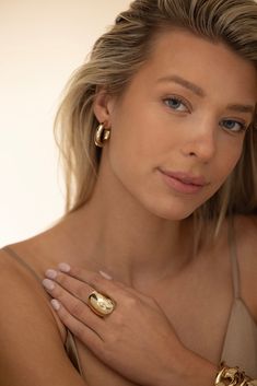 Jennifer Fisher natasha huggie earrings in yellow gold. Available in Silver or 14K Yellow Gold Post, 10K Yellow Gold Plated Brass Inside Diameter: 0.6", Outside Diameter: 1", Thickness: 6mm Named after Jennifer's best friend Natasha, the Natasha Huggies are the perfect bridge between the Lilly and Samira hoop, making them a great everyday addition to your JF hoop collection. Sold as a pair. Fine Jewelry Yellow Gold Huggie Earrings With Polished Finish, Yellow Gold Huggie Earrings With Polished Finish, Yellow Gold Polished Finish Huggie Earrings, Hypoallergenic Yellow Gold Jewelry In Recycled Gold, Hypoallergenic Recycled Yellow Gold Jewelry, Single Huggie Earring In Recycled Gold, Yellow Gold Earrings With Polished Finish From Recycled Gold, Polished Yellow Gold Earrings In Recycled Gold, Polished Yellow Gold Earrings Of Recycled Gold