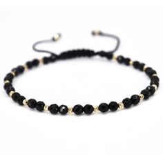 ✨Introducing a masterpiece of craftsmanship and style - our Handcrafted Men's Bracelet, featuring lustrous 4mm faceted black onyx beads interlaced with eighteen 2.5mm 14K gold beads. Designed for the modern man, this bracelet is a symbol of elegance and refined taste. Gold Bracelet Key Features: ✅Premium Handcraftsmanship: Meticulously assembled, each bracelet showcases the precision and care taken in creating this unique piece, ensuring it stands out as a mark of quality and luxury. ✅Exquisite Luxury Black Beaded Bracelet As Gift, Luxury Black Beaded Bracelets As Gift, Classic Black Beaded Bracelets As Gift, Adjustable Black Bracelets With Faceted Beads, Spiritual Black Braided Bracelet With Round Beads, Adjustable Black Bracelet With Faceted Beads, Spiritual Black Bracelets With Faceted Beads, Classic Onyx Beaded Bracelets With Adjustable Fit, Black Bracelets With Faceted Round Beads