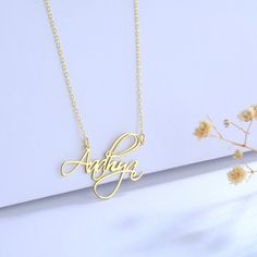 "PERSONALIZED SILVER NAME NECKLACE  Express yourself with our Personalized Name Necklace! With 30 fonts and 3 metals finishes to choose from, you can create a unique look true to who you are. -Material: High Quality 925 Sterling Silver -Finish: Sterling Silver, Gold and Rose Gold  -Sizing: When we say the Personalized Name Necklace is customizable, we mean it! Even the chain length can be easily adjusted between 14\" and 24\" for comfort.  HOW TO ORDER Simply use the 'PERSONALIZATION BOX' to let us know the NAME or WORD you would like. Please specify which font you would like in the dropdown menu, along with the metal and finish. OTHER INFORMATION -All items are nicely packaged ready to gift in elegant jewelry boxes. Our jewelry boxes are reusable and recyclable. SHIPPING TIME -This design Customizable Metal Jewelry For Mother's Day, Metal Charm Necklaces For Mother's Day Anniversary, Metal Charm Necklace For Mother's Day Anniversary, Customizable Metal Necklaces For Mother's Day, Metal Necklace For Mother's Day Anniversary, Custom Name Rose Gold Necklace As Gift, Custom Name Rose Gold Necklace For Gift, Customized Rose Gold Name Necklace As A Gift, Customized Metal Necklaces For Mother's Day