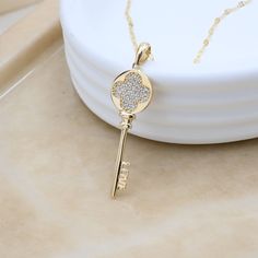 Stunning solid 14k yellow gold big key necklace. Perfect to wear everyday and everywhere, wear it solo or layer it. Unique, elegant and shiny. 14k gold will not tarnish or rust. Perfect addition to your fine jewelry collection. The kind of gift your love one deserves. Materials: 14k gold, Cubic zirconia.  Total weight: 2.5 grams (depending of the lenght). Pendants grams: 1.6 grams.  Necklace thickness: 1.5mm. 14k stamped. Brand new. Fast shipping.  💓 Briza Collections is a small family owned bu Gold Key Pendant Jewelry, Gold Pendant Jewelry With Keys, Luxury Gold Jewelry With Keys, Yellow Gold Key Pendant Jewelry, Key Necklace, Solid Gold Jewelry, Fine Jewelry Collection, Small Family, Real Gold