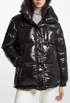 Stay cozy and stylish with this Michael Kors Women's Puffer Jacket in a glossy black color. The jacket features a hood, long sleeves, and a zip closure. It is made of high-quality microfiber fabric with a nylon lining and down insulation material to keep you warm in the winter season. Perfect for travel, casual wear, or business, this mid-length coat has a regular fit and comes in size L. The jacket's accents include a Michael Kors logo and a zipper. Its solid pattern and outdoor theme make it a versatile addition to your wardrobe. Get your hands on this new jacket without tags and step out in style. Black Ski Jacket, Black Down, Puffer Jacket Women, Puffy Jacket, Black Bottoms, Padded Jacket, Ski Jacket, Puffer Coat, Jacket Style