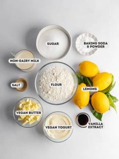 ingredients to make lemon cake laid out on a white surface with text describing the ingredients