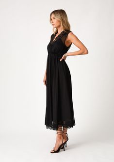 A classic black boho holiday dress with delicate lace detail. Chiffon Relaxed fit Sleeveless Midi length Lace trim Surplice v-neckline Half-smocked bodice at the back Open back detail with single button closure Empire waist Lined Bohemian holiday dress Delicate lace details add a pretty touch to this sophisticated holiday midi dress. Featuring a sexy surplice v-neckline and an open back detail with single-button closure. A versatile style for your next holiday party or date night, we love to pai Affordable Dresses With Button Closure For Date Night, Affordable Midi Length Sleeveless Dress For Date Night, Affordable Sleeveless Holiday Dress, Affordable A-line Midi Dress With Button Closure, Affordable Casual Midi Dress For Date Night, Affordable Casual Dress For Date Night, Boho Holiday Dress, Affordable Boho, Bohemian Holiday