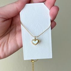 Dainty Gold Heart Necklace, Minimalist Jewelry, Birthday Gift, Waterproof Necklace, Sweetheart Charm Necklace, Natural White Shell PRODUCT DETAILS --Lead-free and Nickel-Free, a great choice for sensitive skin --Hypoallergenic --Tarnish-Free  --WATERPROOF and SWEAT-RPOOF --Material: 18k Gold Plated Over Stainless Steel --Size: Chain is 16 in + 2 in extender, Heart is 0.4 in (11mmx12mm) SHIPPING & PACKAGING Our jewelries are well packaged with care and will be shipped out within 1-3 business days White Heart Necklace With Clavicle Chain As Gift, White Heart Clavicle Chain Necklace As Gift, White Heart Pendant Necklace With Clavicle Chain, Dainty White Heart-shaped Necklace, Dainty White Charm Necklaces For Birthday Gift, White Heart Charm Necklace For Birthday, Dainty White Charm Necklace For Birthday Gift, White Heart Pendant Jewelry For Birthday, White Heart Pendant Necklace For Birthday