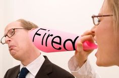 a man and woman are talking to each other while holding a pink megaphone with the word fired written on it