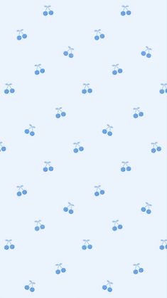 blue cherries on a light blue background with white dots and lines in the center