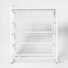 a white shelf with three shelves on each side