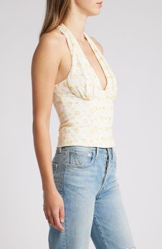 Charming ombré floral embroidery covers this stretch-kissed top designed in a halter silhouette for trendsetting appeal. 8 1/2" length (size Medium) Back button-and-loop closure Halter neck Sleeveless, with cutaway shoulders Lined 95% polyester, 5% elastane Dry clean Imported Fitted V-neck Tank Top For Spring, Fitted V-neck Floral Print Tank Top, Fitted Floral Print Halter Neck Tank Top, Fitted Halter Neck Tank Top With Floral Print, Chic Fitted Floral Halter Top, Fitted Halter Neck Top For Summer, Chic Fitted Tops With Floral Embroidery, Fitted Floral Print V-neck Tank Top, Fitted Floral Print Crop Top