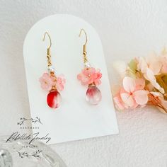 🌸 Handmade Sakura Drop Earrings - Embrace the Charm of Cherry Blossoms 🌸 Add a touch of whimsy to your ensemble with our delightful Sakura Drop Earrings, crafted to capture the essence of springtime beauty. Featuring cute cherry blossom flowers bunched atop glass teardrops, these earrings exude cottagecore charm and are perfect for your springtime outings.  Key Features: Adorable Cherry Blossom Design: Each earring showcases cute cherry blossom flowers delicately bunched on top of glass teardr Picturesque Aesthetic, Cute Cherry Blossom, Cottagecore Accessories, Earrings Cottagecore, Cherry Blossom Design, Jewelry Materials, Cherry Blossom Flowers, Color Flower, Purple Earrings