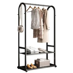 an iron rack with clothes and shoes on it