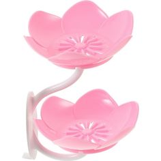 a pink flower shaped object on a white background