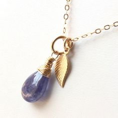 5983 Tanzanite Pendant or Necklace Gold Filled wire wrapped natural violet blue gemstone leaf charm minimalist dainty solitaire choker mothers day birthday anniversary or holiday gift for her women mom sister wife girlfriend niece aunt grandma cousin best friend colleague. Enjoy the beauty & power of natural gemstones - find TANZANITE healing properties below. THIS LISTING IS FOR THE NECKLACE ONLY Earrings shown for illustration and listed separately MATERIALS & DIMENSIONS ✦ Natural TANZANITE, v Delicate Adjustable Teardrop Jewelry, 14k Gold Filled Charms Jewelry As Gift, Minimalist 14k Gold Filled Teardrop Jewelry, Delicate Adjustable Pendant Jewelry, Minimalist Gemstone Dangle Jewelry, Dainty Dangle Charm Necklaces As Gift, Dainty Dangle Charm Necklaces For Gifts, Tanzanite Gemstone Round Pendant Jewelry, Tanzanite Gemstone Round Pendant