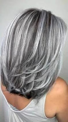 This elegant and fashionable wig is the perfect accessory to elevate any look. Whether for a special occasion or everyday wear, this wig is versatile and easy to style. Do you wanahavit? Grey Hair Transformation, Gorgeous Gray Hair, Grey Hair Inspiration, Gray Hair Growing Out, Silver Hair Color, Silver Grey Hair, Blending Gray Hair, Gray Hair Highlights, Long Gray Hair