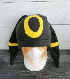 These hats are made from fleece and interfacing in the ears but still have floppiness to them and do not stand up (sorry but I do not offer this option). ⫸ Perfect for: fans, cold weather, costumes, or conventions. Very warm! ⫸ Size: Fits anyone age 5+, one size fits most. Circumference about 24-25 in. ⫸ Care instructions: I recommend hand wash but should be fine in machine wash cold. All hats are made in a smoke-free, pet-free environment. All hats are made with a sewing machine. Patterns and d Beanie Sewing Pattern, Weather Costumes, Shiny Umbreon, Pokemon Hat, Fleece Hats, Fleece Hat, Hat Ideas, Sewing Machine, Cold Weather