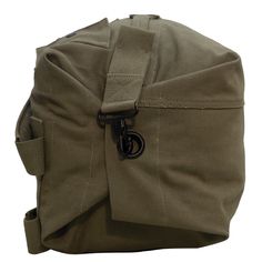 The Rothco Nomad Canvas Duffle Backpack is designed for the modern adventurer who values both style and functionality. Crafted from ultra-durable 22 oz cotton canvas, this versatile backpack combines the spaciousness of a duffle bag with the convenience of a backpack. With its reinforced stitching and multiple carrying options, it's perfect for frequent travelers, outdoor enthusiasts, or anyone looking for a reliable, rugged bag for their next adventure. Spacious 38-Liter Capacity: Large enough Large Capacity Cotton Duffle Bag, Travel Duffle Bag In Khaki Canvas, Durable Military Style Bag For Everyday Use, Military Style Durable Bag For Everyday Use, Khaki Canvas Duffle Bag For Travel, Military Style Khaki Bag For Adventure, Khaki Military Style Bag For Adventure, Practical Canvas Travel Bag For Outdoor, Outdoor Cotton Canvas Bag With Zipper Closure