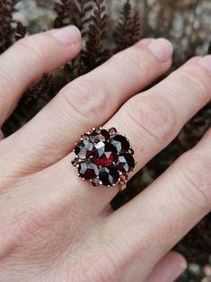 1920s antique German Garnet Ring, US Size 6 3/4, marked '333' for 8k gold and makers' mark. Amazing ring with beautiful garnet cluster, in good antique condition.  Material: 8k gold, garnet Total weight: 3.4 g US Size: approx. 6 3/4 (EU size 54) Gold Garnet Ring, Lehenga Red, Pretty Accessories, Bridal Lehenga Red, Art Deco 1920s, Garnet Gem, Needle Case, Ring Art Deco, Garnet Ring