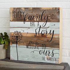 a wooden sign that says, every family has a story welcome to ours